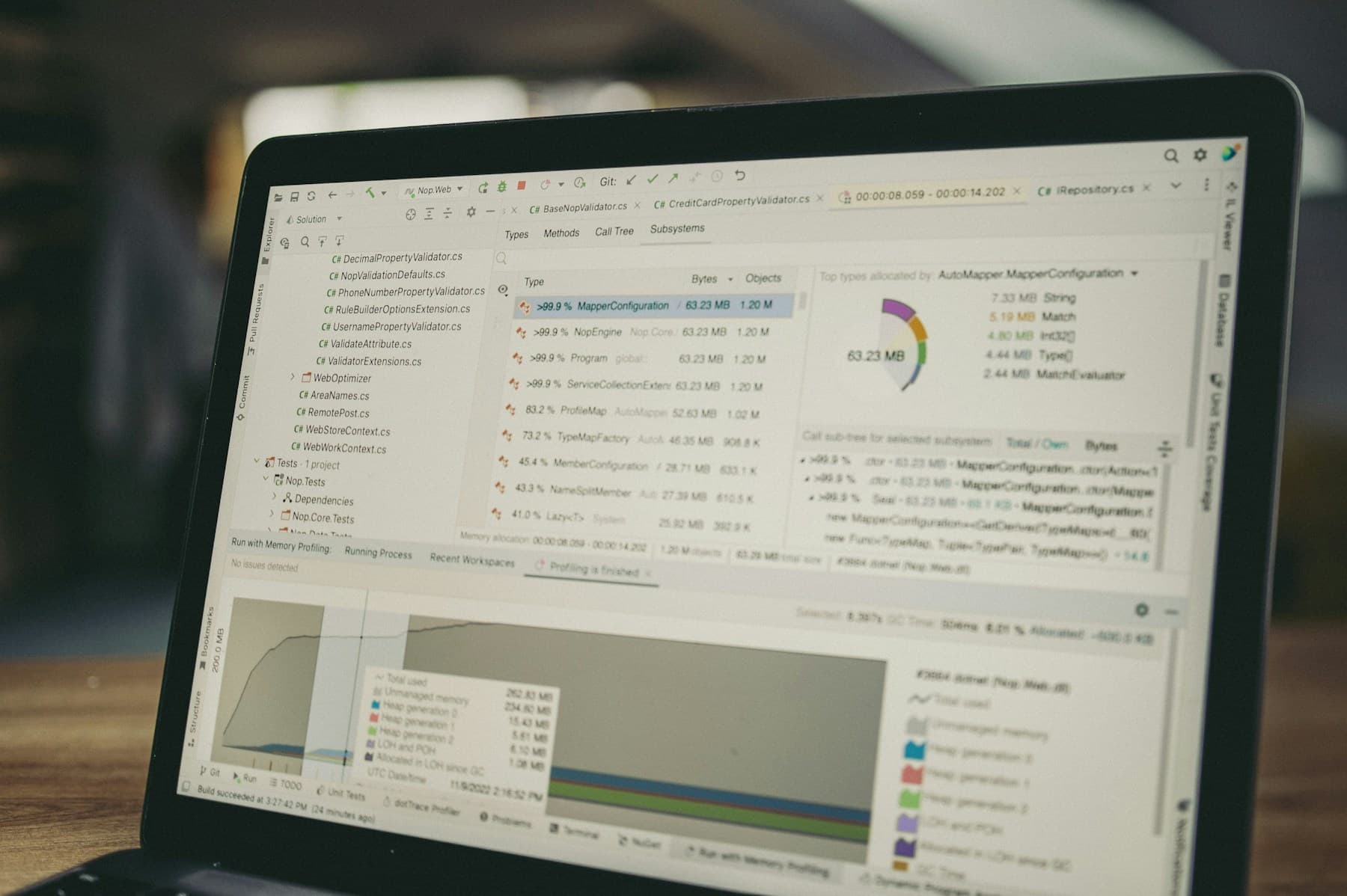 Software and data visualizations displayed on an engineering laptop